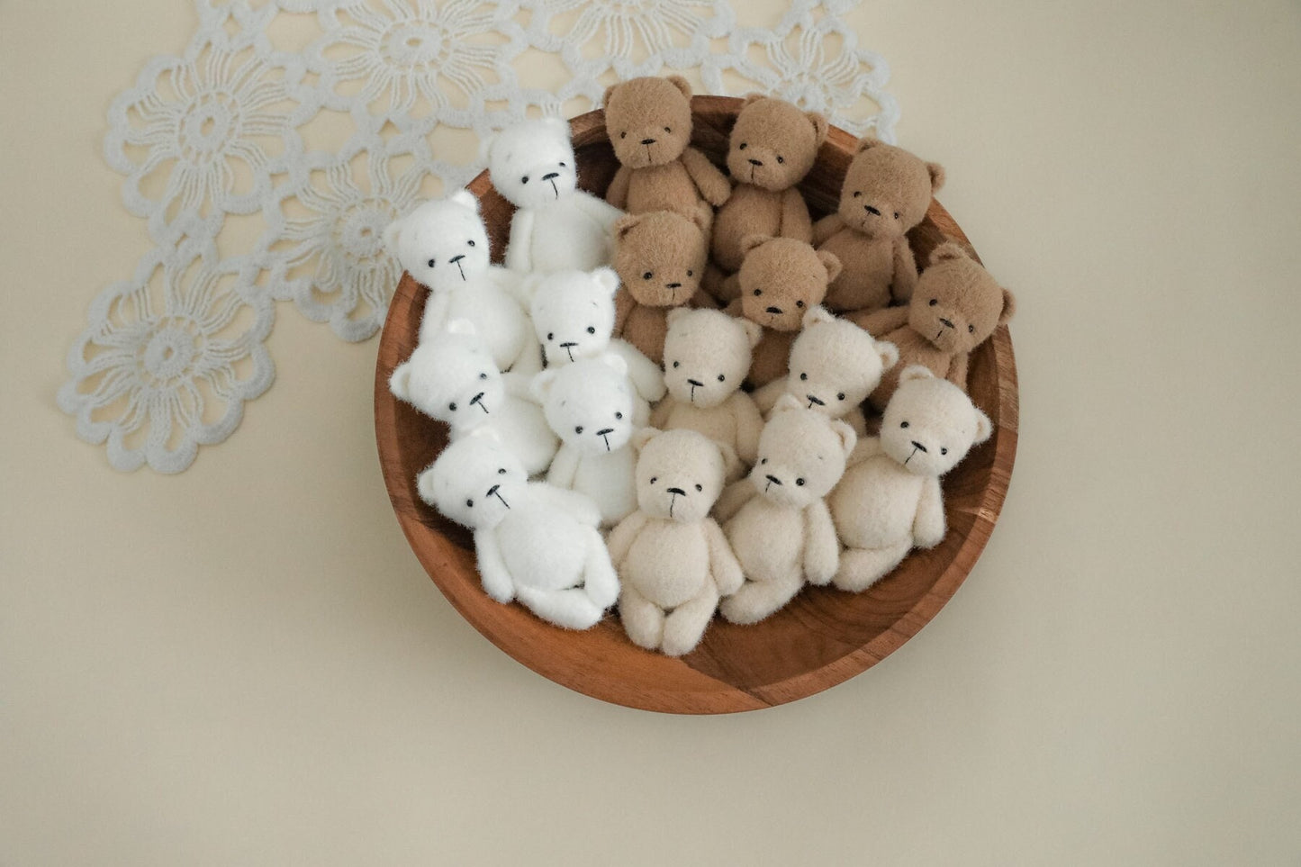 Knitted teddy bear toys for newborn babies.
